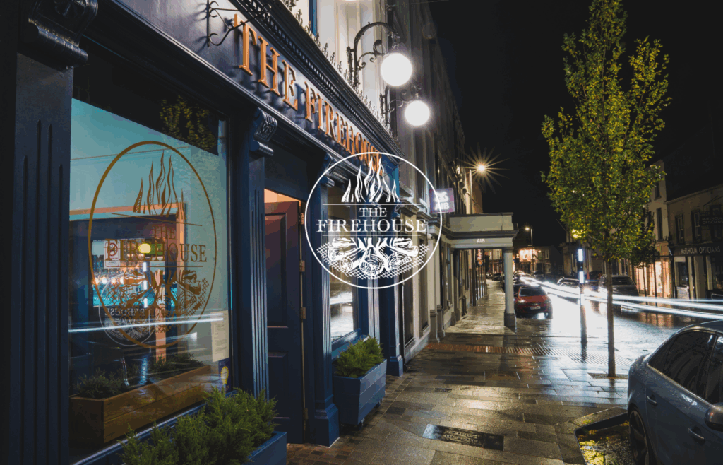 Exterior shot of the Firehouse Enniskillen at night where to eat in enniskillen on a rainy day - family friendly restaurant