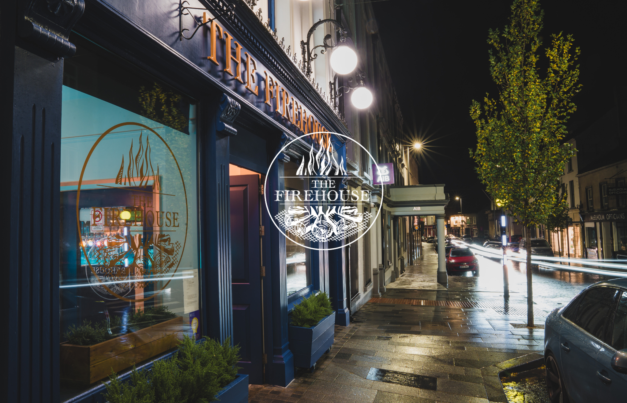 Exterior shot of the Firehouse Enniskillen at night where to eat in enniskillen on a rainy day - family friendly restaurant - enniskillen food scene - best restaurant enniskillen