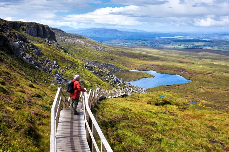 bank holiday dininf ideas in Enniskille. tourist hiking along the Cuilcagh boardwalk trail and stairway to heavy
